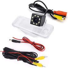 eHANGO Car Rear View Camera Bracket License Plate Lights Housing Mount for Hyundai ix45 / Santa Fe DM/Grand Santa Fe/Maxcruz KDM/KIA Carens RP MK3 / KIA Rondo RP (12 LED)