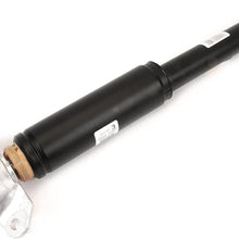 GM Original Equipment 560-944 Rear Passenger Side Shock Absorber with Boot, Upper Mount, and Nut