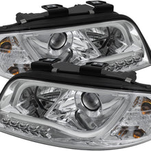 Spyder Auto (PRO-YD-ADA601-LTDRL-C) Audi A6 Chrome Halogen Projector Headlight with LED Daytime Running Light Tube