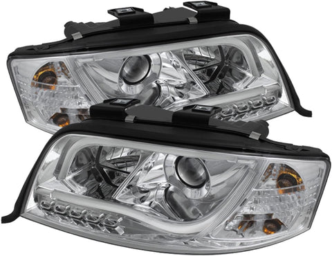 Spyder Auto (PRO-YD-ADA601-LTDRL-C) Audi A6 Chrome Halogen Projector Headlight with LED Daytime Running Light Tube